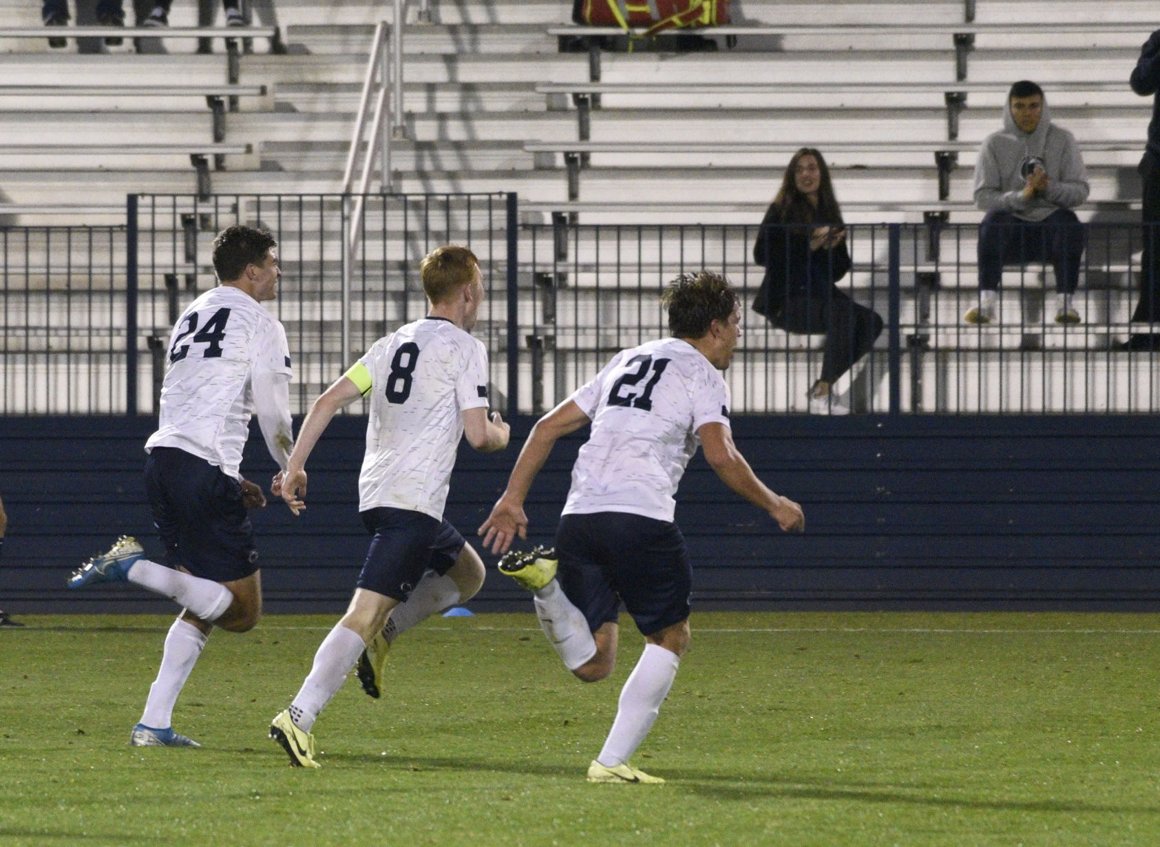Men's soccer vs. Maryland, Sload (24), Molloy (8) and May (21)